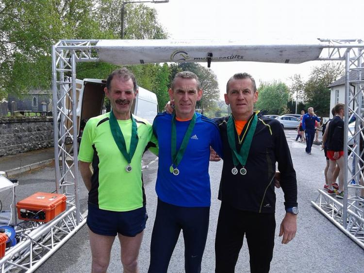 Harriers M50 team with their Leinster Silver medals - Brendan Abbott, John Donegan & Christy Donegan