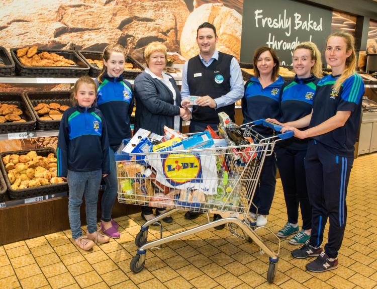 Representatives of Naomh Ciaran collect their prize