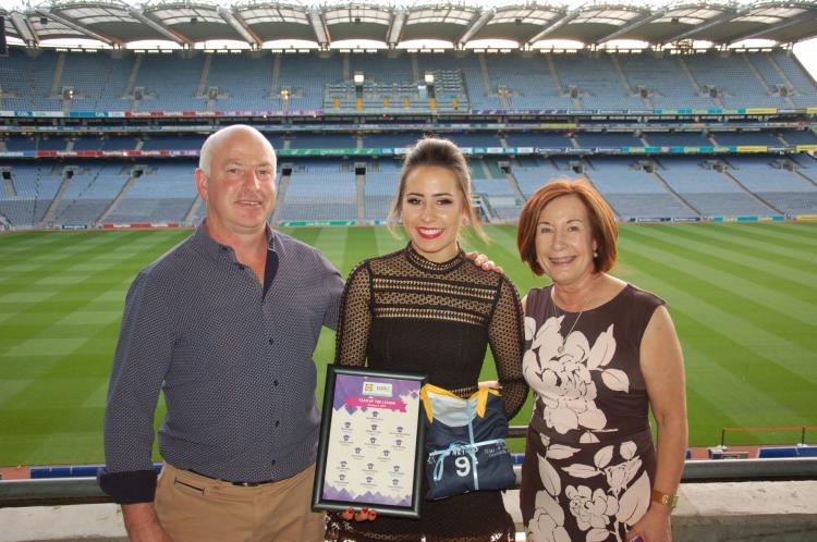 Offaly's Ellee McEvoy with her parents at the Team of the League Awards in Croke Park
