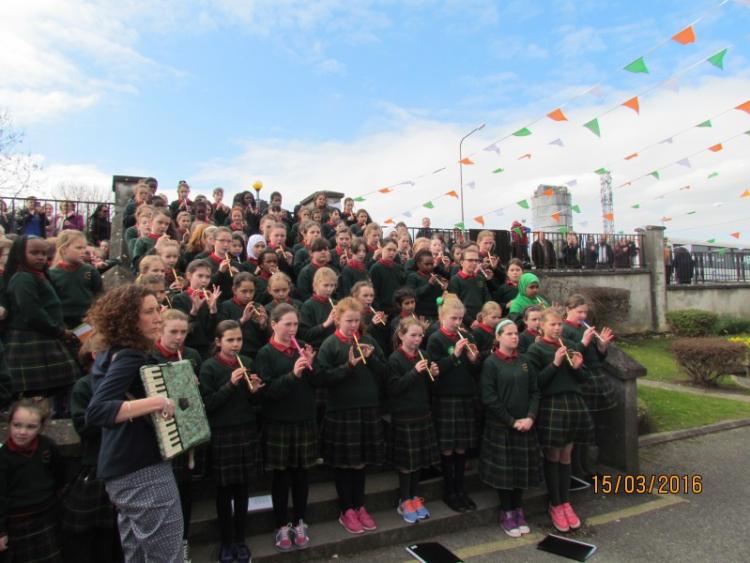 Scoil Mhuire read Proclamation and proudly raise Irish flag