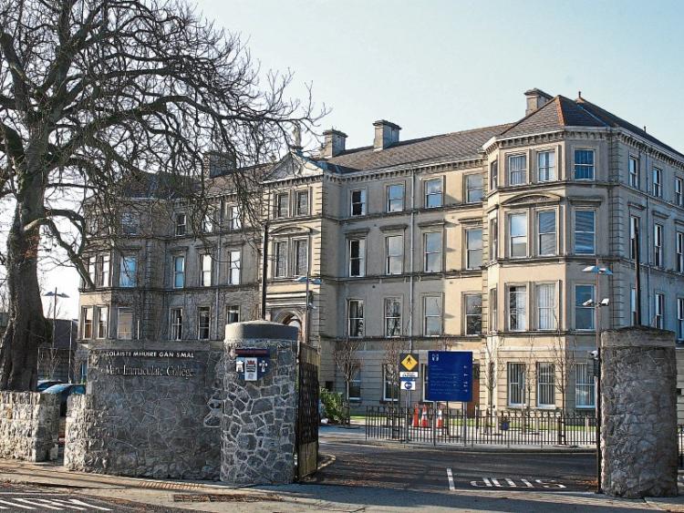 MIC: Acting president Eugene Wall informed students of the 'untimely death' of student Rachel Spain