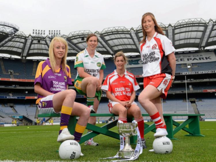15 July 2013; Pictured at the launch are junior players, from left to right, Kellie Kearney, Wexford, Siobhan Flannery, Offaly, Grace Lynch, Louth, and Ashelene Groogan, Derry. September 29th will be the 40th time that the final of the Senior Ladies Gaelic Football Final will be contested. The first final took place in October 1974 and was contested by Tipperary and Offaly in a game that was won by the Tipperary women. The most successful team in the history of the game are Kerry who have won the title on 11 occasions including an unprecedented 9-in-a-row. In recent years Cork have been the dominant force winning 7 of the last 8 titles. TG4 made the announcement that RefCam will be introduced to Irish Sport for the first time. The lightweight head mounted device will be a feature of TG4s live coverage of the 2013 Ladies Football Championship and will provide viewers with unique insight into the game but it will also be a hugely valuable coaching resource for referees. 2013 TG4 All-Ireland Ladies Football Cha