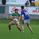Offaly's Rory Egan sizes up his options as Dara McVeety challenges. Pic Ger Rogers Photo.