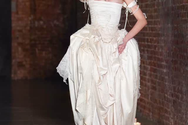 That tension was palpable on the candlelit runway of her autumn/winter 2026 collection, The Court of the Maddest, Merriest Things Alive, at the Beaconsfield Gallery in London.