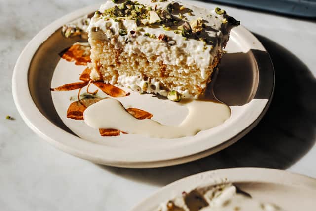 Ingredients(Serves 8-10)150ml milk397g can condensed milk350ml evaporated milk2tsp Somali tea spice24 Madeira cake slices (510g) or doolsho500ml double (heavy) or whipping cream100g icing (confectioners’) sugar1tsp vanilla bean paste100g crushed pistachiosEquipment: 23 x 30-cm/9 x 12-inch baking dish