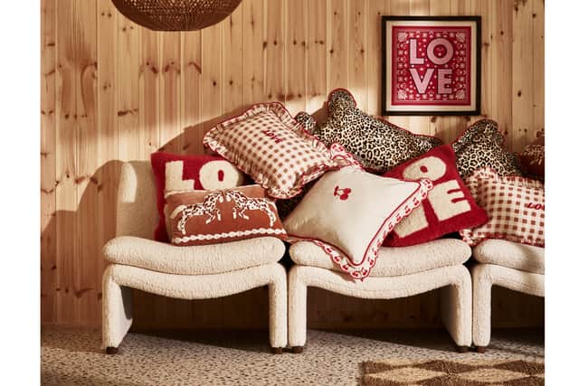 5. Oliver Bonas Brown & Red Frill Love Gingham Cushion Cover, 30 x 50cm, £26.50; Brown & Red Ruffle Leopard Print Cushion Cover, 45 x 45cm, £29.50; White & Red Cherry Cushion Cover, 45 x 45cm, £32.50, Red & Cream Love Tufted Cushion Cover, £29.50, Oliver Bonas