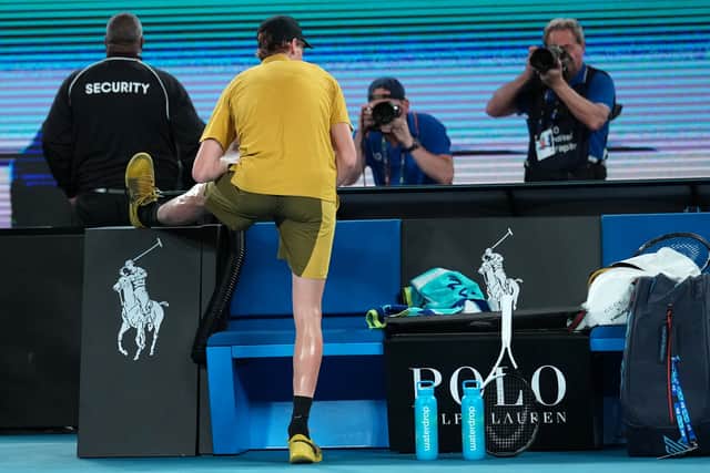 Sinner continued to look uncomfortable but, out of the punishing sun and with air conditioning cooling the arena, he battled to a 4-6 6-3 6-4 6-4 victory.
