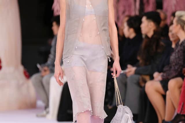 Based on the runway and this week’s previous haute couture shows, it seems an emerging trend may be millennium pink, alongside sheer tulle, peplum trims and airy, weightless tailoring.