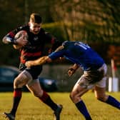 Jarlath Glynn fends off a St Mary’s player on Saturday afternoon in Spollanstown. Picture Darragh Bell.
