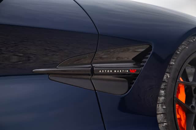 But why is it here in the crucible of motoring, which is Road Test of the Year? Well, for starters, in a field of electric vehicles and SUVs, it’s something to still have a V12-powered supercar on the roads. In 2025, with ever-tightening emissions and EV-only targets, these combustion-engined monsters are starting to feel like an endangered species, which is why the Vanquish Volante was greeted with more than a bit of adoration when it first swept into a gritty lay-by in our south Wales location.