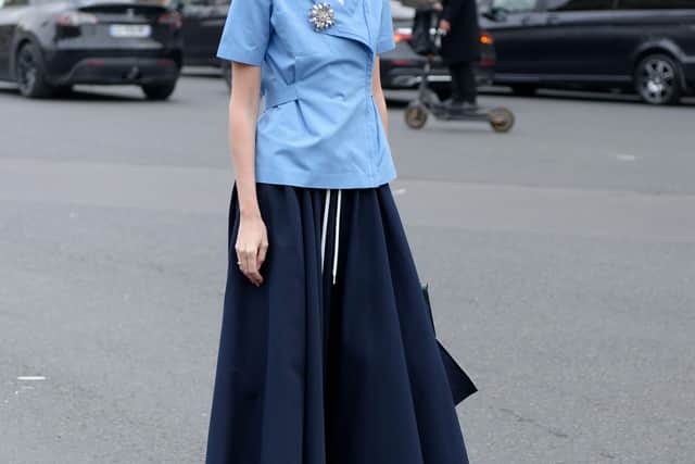 “We do like grey. We do like black. We do like some pops of green and we wear navy blue a lot.”