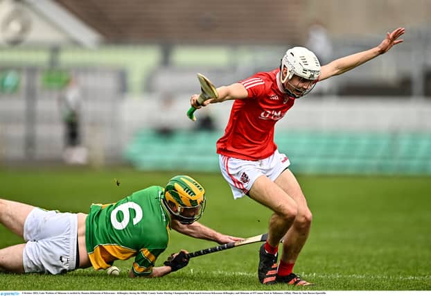 Luke Watkins is tackled by Cillian Kiely in the 2022 final