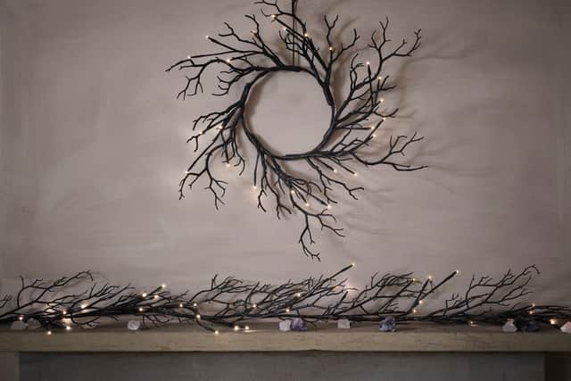 1. Pre Lit Black Glitter Halloween Wreath & Garland, £44.99, Lights4fun