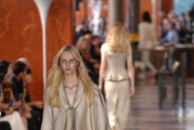Metallics are often associated with ostentatious glamour, but here, Louis Vuitton managed to downplay the result by using silk-like finishes paired with lightweight, billowing silhouettes. The look was more nuanced than nightclub shimmer and all the more effective for it.