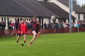 Conor Dunne kicking a penalty for Tullamore