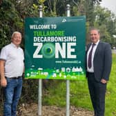 Cathaoirleach of Tullamore Municipal District Cllr Declan Harvey with Tony McCormack TD at the unveiling of new decarbonising signs in Tullamore