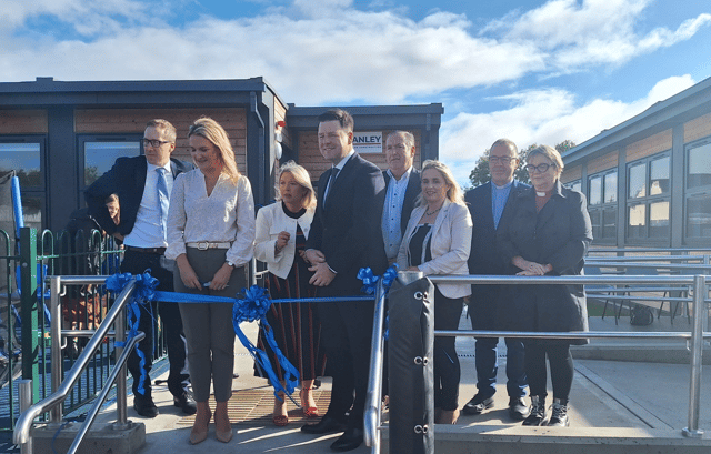 Education Minister, Helen McEntee prepares to cut the tape for the opening of the new classrooms