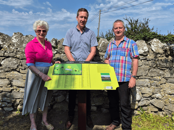 Cllr Neil Feighery, centre, with Breda and Odran Condron
