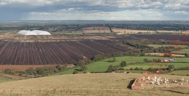 An architect's impression of the proposed domes viewed from the top of Croghan Hill with the graveyard to the right of the image. A yellow-like colour has also been proposed for the domes