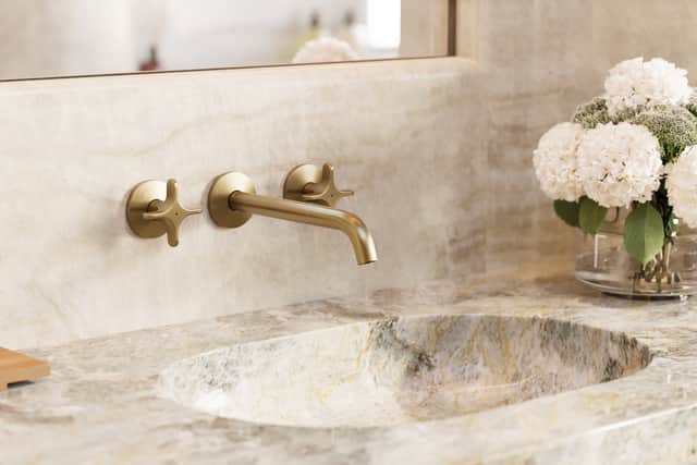 “When it comes to taps, steer clear of harsh, boxy designs,” underlines Freeman. “Instead, choose cylindrical taps with flowing spouts and tactile handles that exude quiet luxury.”