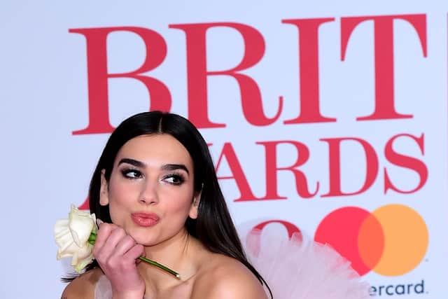 Lipa’s fashion has undoubtedly helped propel her onto our algorithms. Her early red carpet appearances – like the 2018 Brit Awards’ blush Giambattista Valli tulle gown and the punky Vivienne Westwood corseted mini at the 2021 Brits – showed she isn’t afraid of drama or versatility.