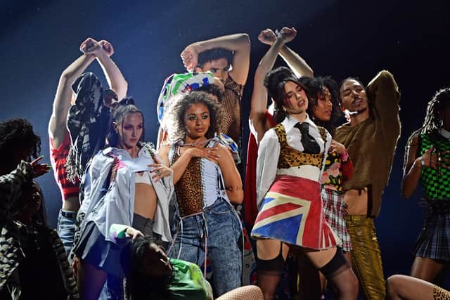 On stage, she performed a medley of songs from “Future Nostalgia” wearing a Union Jack mini kilt and a white shirt, referencing the Spice Girl’s Geri Halliwell’s iconic 1997 Brits look.