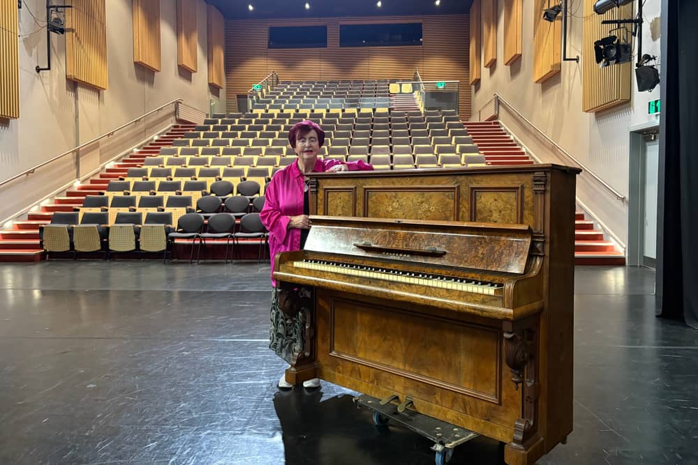 Colette O'Sullivan with the piano which has been donated to Esker Arts