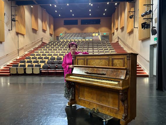 Colette O'Sullivan with the piano which has been donated to Esker Arts