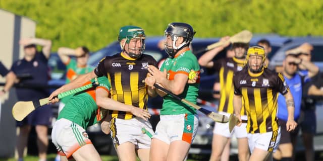 Michael Gilligan (Seir Kieran) tries to burst past Ailbe Watkins and Colm Mulrooney (Birr). Picture: Aoife Maher.