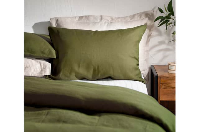 7. French Linen Bedding And Bed Sheets – Olive Green, Double Duvet Cover from £95, (was £175); Double Deep Fitted Sheet, £70, (was £109); Standard Housewife Pillowcase Pair, £30, (was £50), Soak &amp; Sleep