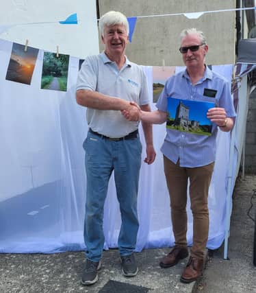 Martin Guinan received his prize from Mr Paddy Egan, Ferbane Credit Union.