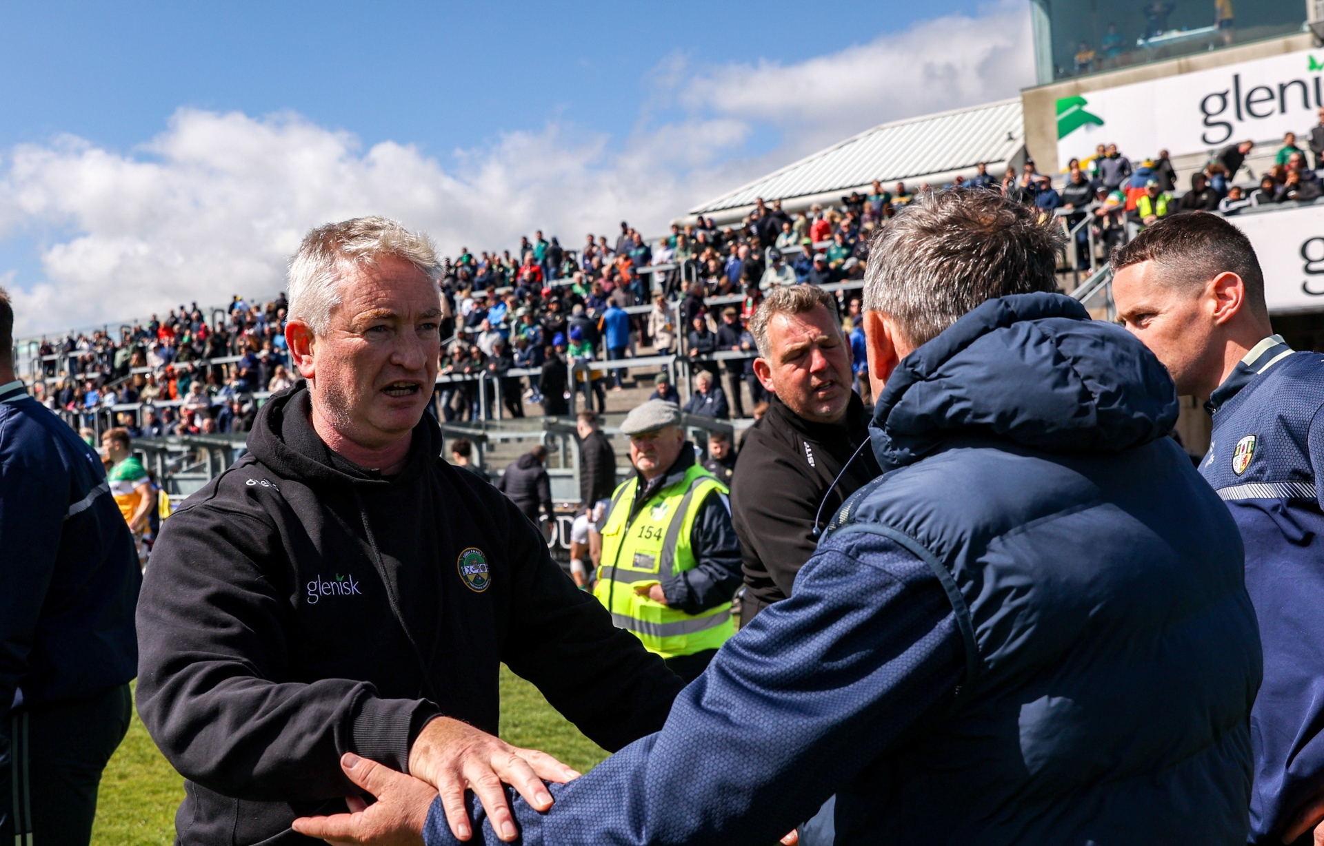 Johnny Kelly and Davy Fitzgerald shake hands after Offaly's win