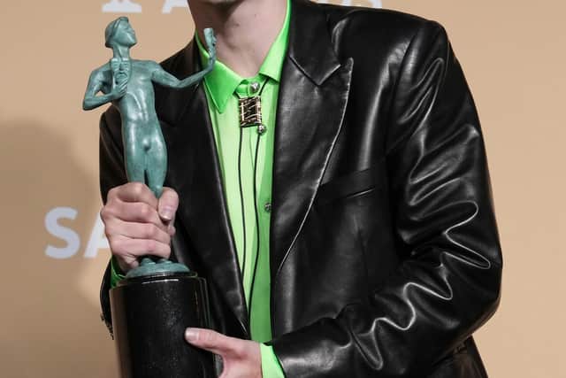 The 29-year-old actor paired a custom edgy Chrome Hearts black leather suit with a striking Brat-green shirt for a bold contrast.
