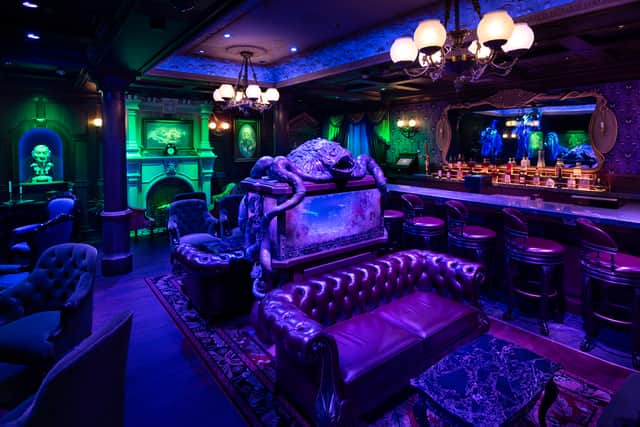 Suitcases in the parlour’s hallway, stacked beneath Tomb Sweet Tomb embroidery, are secretly monogrammed with the design team’s initials . Flash photography is not permitted here – ghosts are sensitive. The devil’s in the immaculate details (and, possibly, the flickering light fixtures).