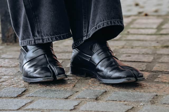 An enduring example of Galliano’s impact is the revival of the infamous ‘Tabi’, the iconic Margiela shoe originally launched in 1988, which has become ubiquitous within Gen Z street style.