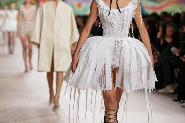 Dior’s Maria Grazia Chiuri integrated bows into sophisticated and structural ensembles, balancing femininity and power.