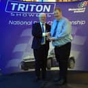 Eoin Longworth collecting the Clerk of the Course award.