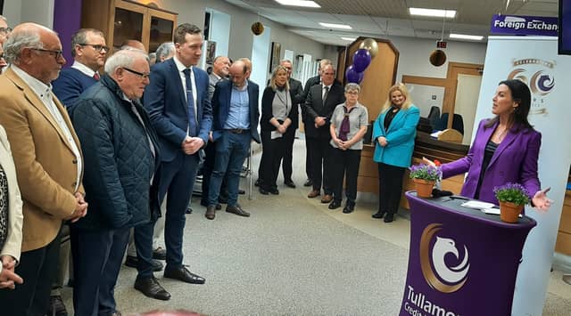 Then Minister of State Jennifer Carroll MacNeill (right) with (extreme left) her father Denis Carroll, Tullamore Credit Union's first manager