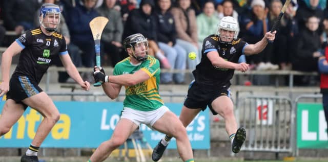 Shane Guinan (KK), shoots as Joey Keenaghan (Clodiagh Gaels) tackles. Picture: Aoife Maher