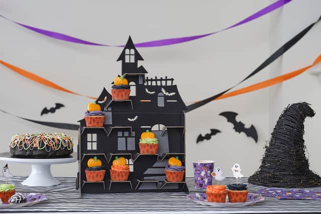 7. Black Haunted House Cupcake Stand, £7, Hobbycraft