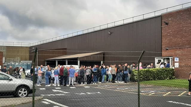 Workers at the Cardinal Health factory in Tullamore following the official announcement of its closure recently