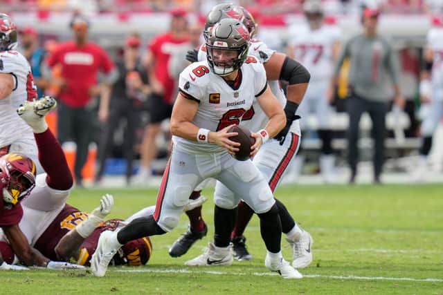 Baker Mayfield threw for four touchdowns as the Tampa Bay Buccaneers eased past the Washington Commanders 37-20.