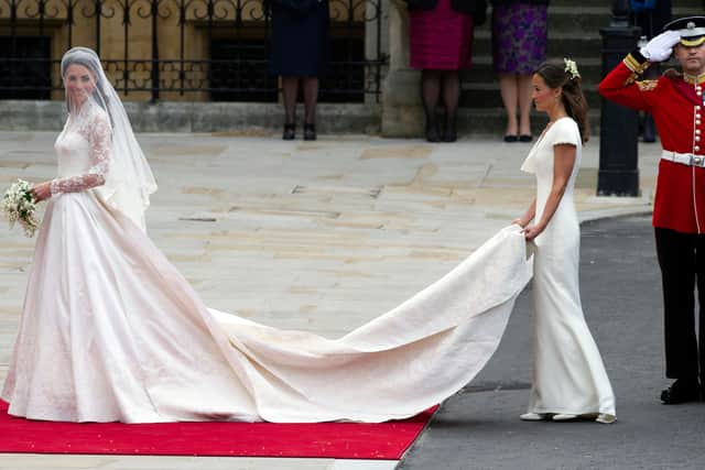 But her most notable fashion moment came in 2011, when she designed Kate’s wedding dress – an intricate ivory gown with lace applique floral detail. The skirt of the wedding dress was intended to represent an opening flower with its subtle pleating.