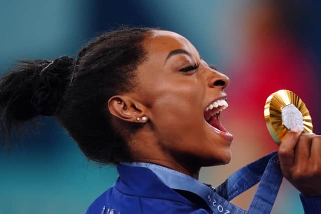 Biles back on top
