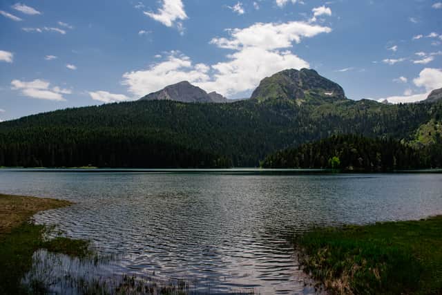 Part of the Dinaric Alps, Durmitor’s highest peak reaches 2,523 metres. However, it’s the famous black lake – Crno Jezero – that I’m interested in. It takes it’s dark shade from the pine forest its surrounded by, the trees casting a reflecton on the water. In the spring, a waterfall feeds glacial water from the Alps into the lake, but in the height of summer the black lake is somewhat diminished in size.