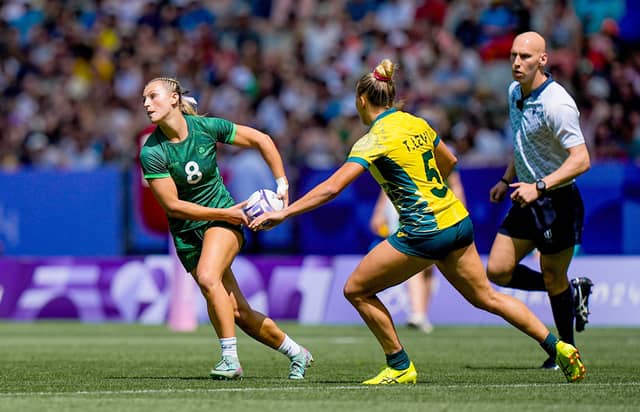 Megan Burns (left) in action for Ireland against Australia in the Pool B clash