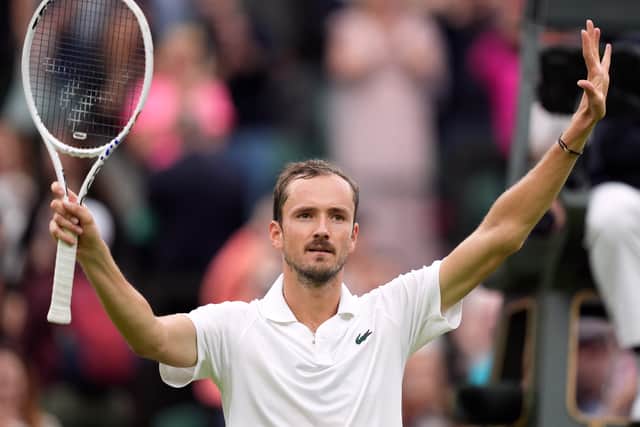 Fifth seed Daniil Medvedev won his first match on Centre Court in seven years.