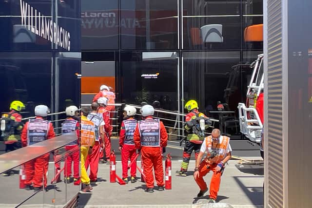 British driver Lando Norris was among those evacuated as the blaze broke out less than an hour before final practice.