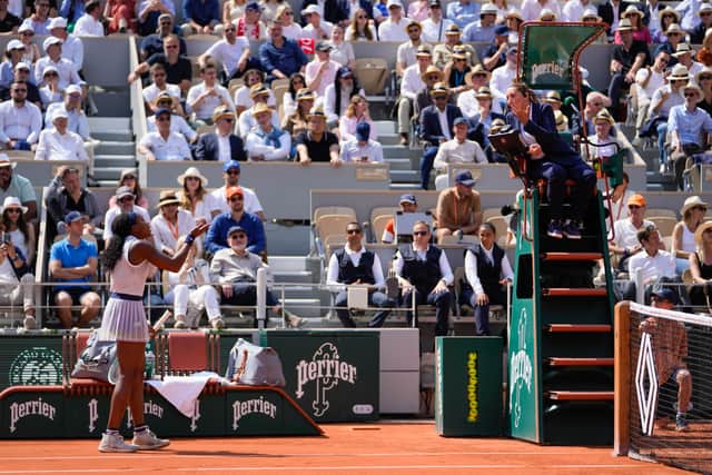 The 20-year-old American then wiped tears from her eyes as boos rang out all around Court Philippe Chatrier.