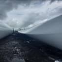 The giant, futuristic looking,  fibreglass blades of a wind turbine under construction this week in the Clongawny / Derrinlough Bog near Birr.